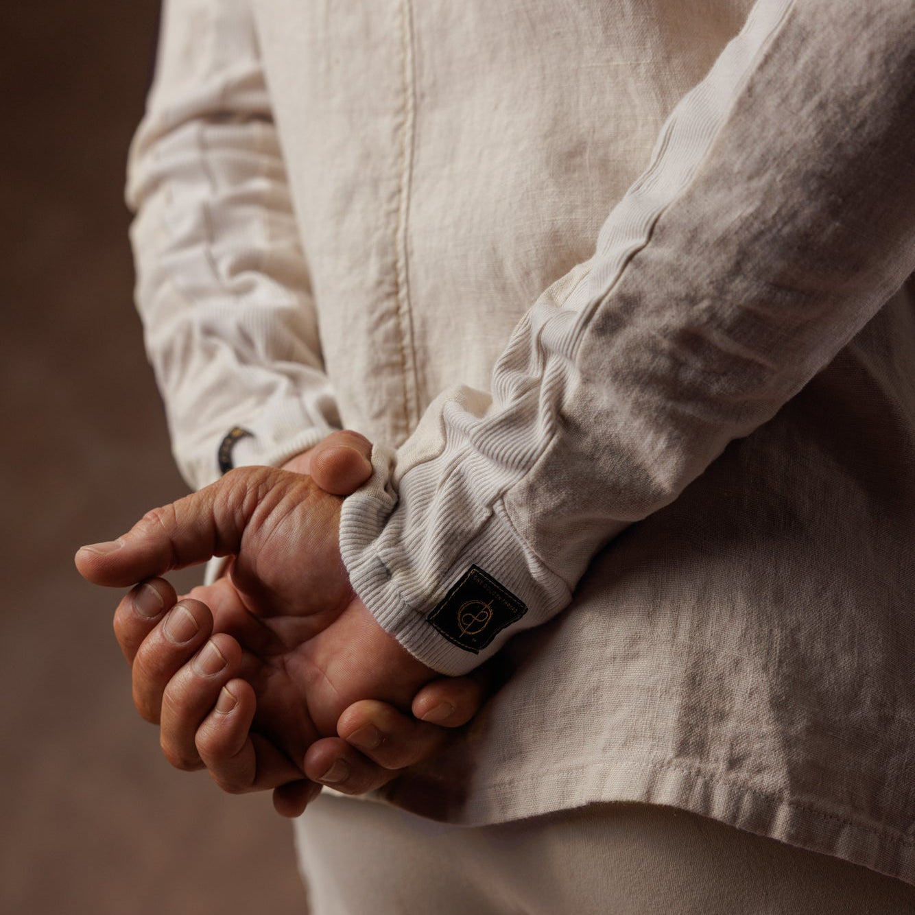 male modeling linen shirt in white stone